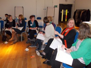 Participants in Birmingham chatting away during the Story of Change activity